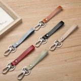 Брелок, подвеска, брендовый ремешок подходит для мужчин и женщин, из натуральной кожи, простой и элегантный дизайн