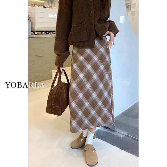 Who looks good in whoever wears it? A plaid skirt that you can wear with your eyes closed