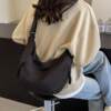 Japanese one-shoulder dumpling commuting crossbody bag 2026 new style