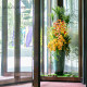 Hotel revolving door artificial flowers
