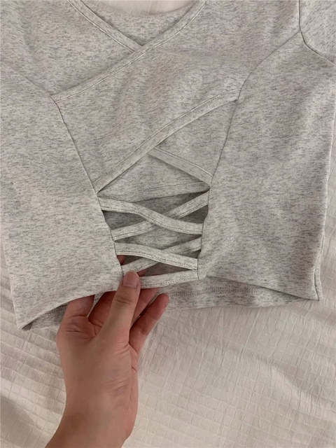 New summer slim and slim shoulder T-shirt for women for women short sleeves pure hot girls short back hollowed-out top with chest pad