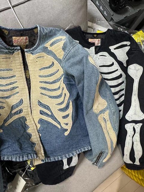 Collarless washed embroidered denim jacket