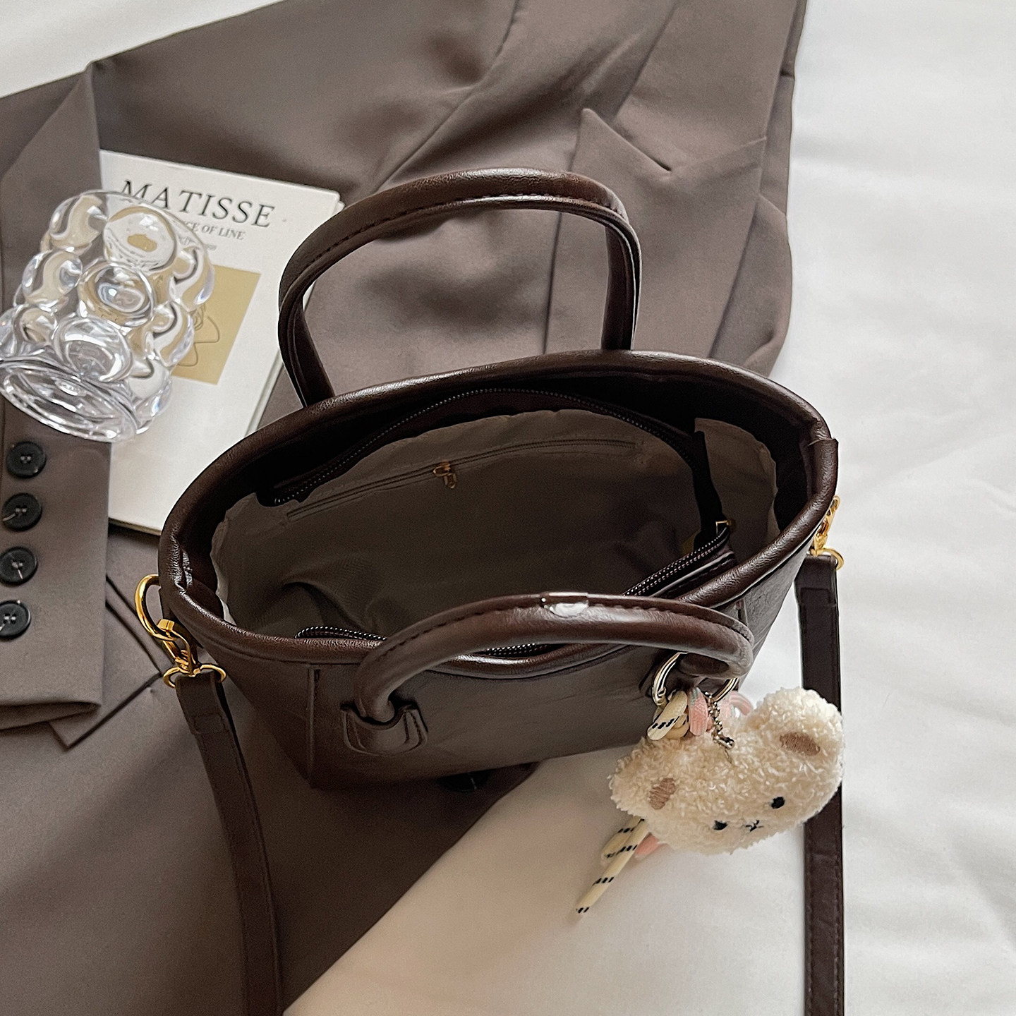 高级感手提包包女2025新款时尚百搭单肩斜挎包秋冬复古通勤水桶包,淘宝优惠券,粉丝福利购,淘宝优惠卷