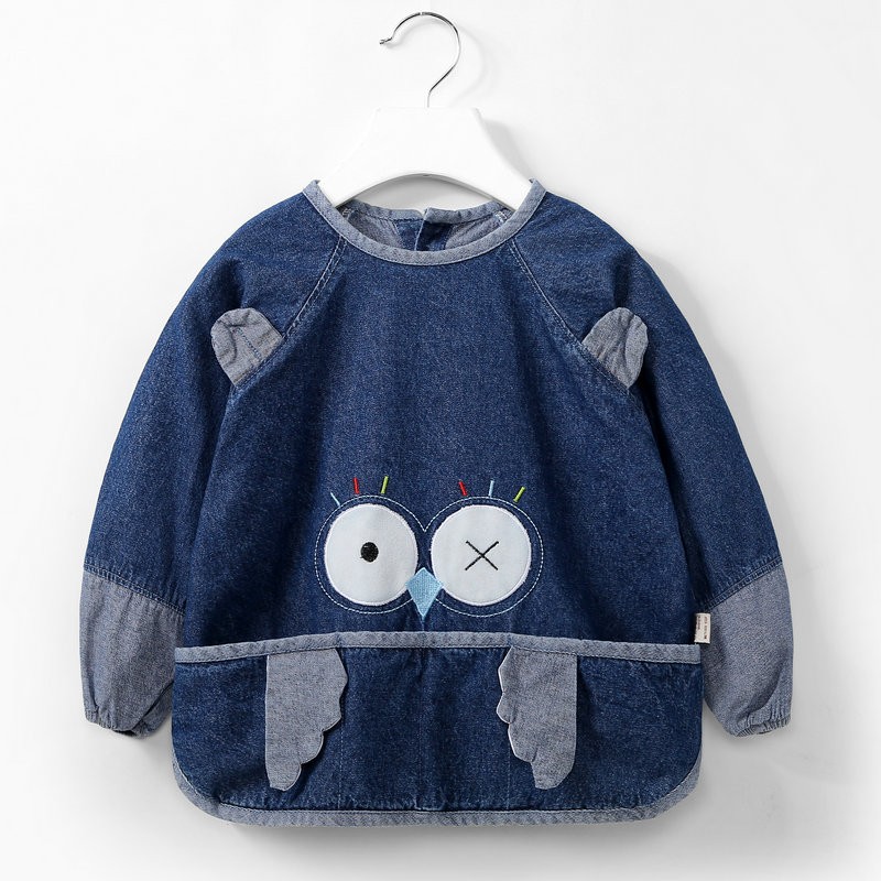 Denim infant and toddler cartoon style girls' bibs worn backwards