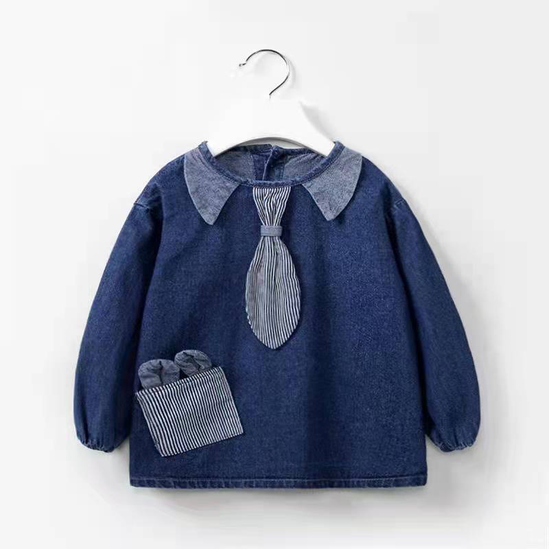 Denim infant and toddler cartoon style girls' bibs worn backwards