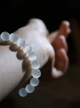 和田玉白冰一线猫眼圆珠手串