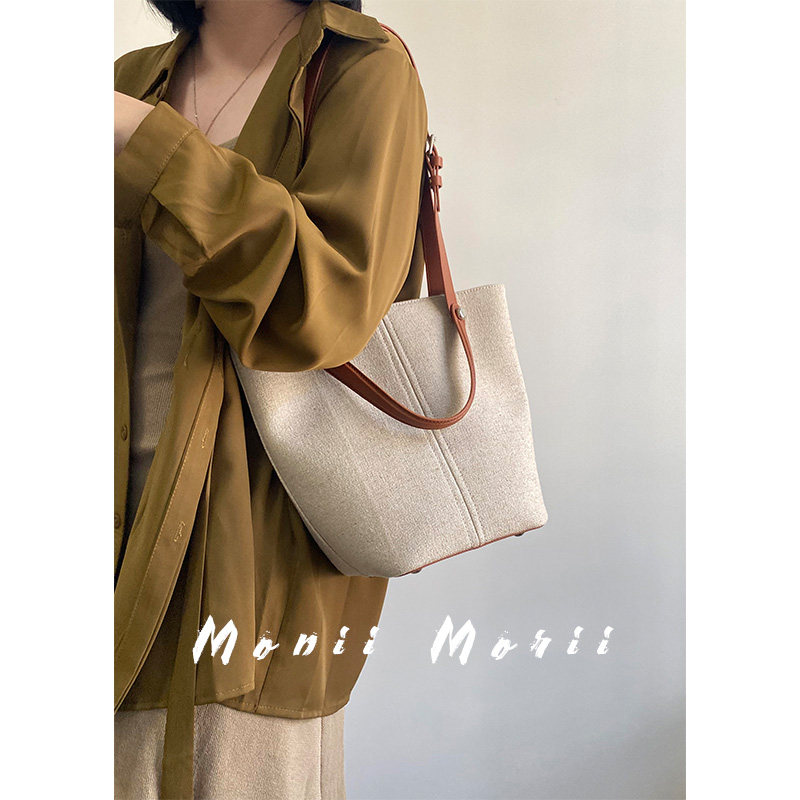 怪兽君包包2025新款水桶包时尚通勤单肩包百搭手提包复古菜篮子包,淘宝优惠券,粉丝福利购,淘宝优惠卷