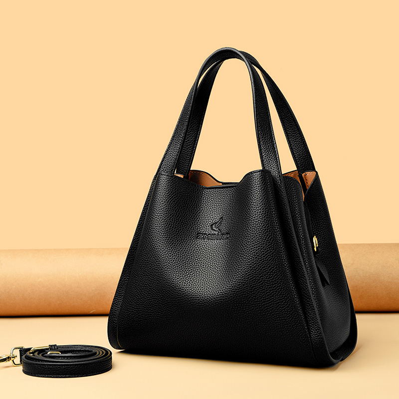 真皮女包时尚水桶包2025新款轻奢小众牛皮单肩腋下包大容量斜挎包 - 图1