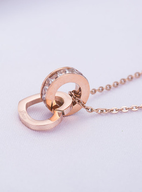 韩版钛钢玫瑰金潮流双环爱心镶钻