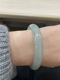 Songdu bracelet with uninlaid jadeite ring