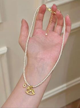 “马上有钱”环扣金色小马黑色抽拉编织手绳女小众设计精致手链