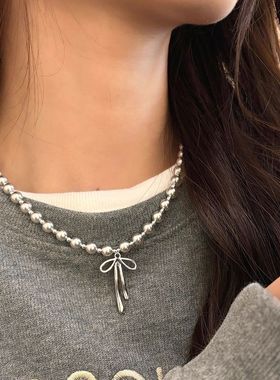 蝴蝶结仿珍珠项链女2025年新款配饰锁骨链轻奢小众高级感毛衣链女