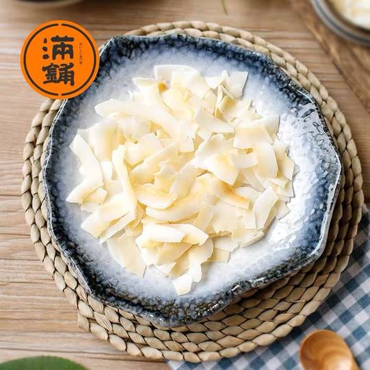 Patatas fritas de hojuelas de coco especiales de Hainan Hojuelas de coco asadas originales listas para comer Carne de coco Trozos crujientes de coco Bocadillos finos y crujientes de coco seco