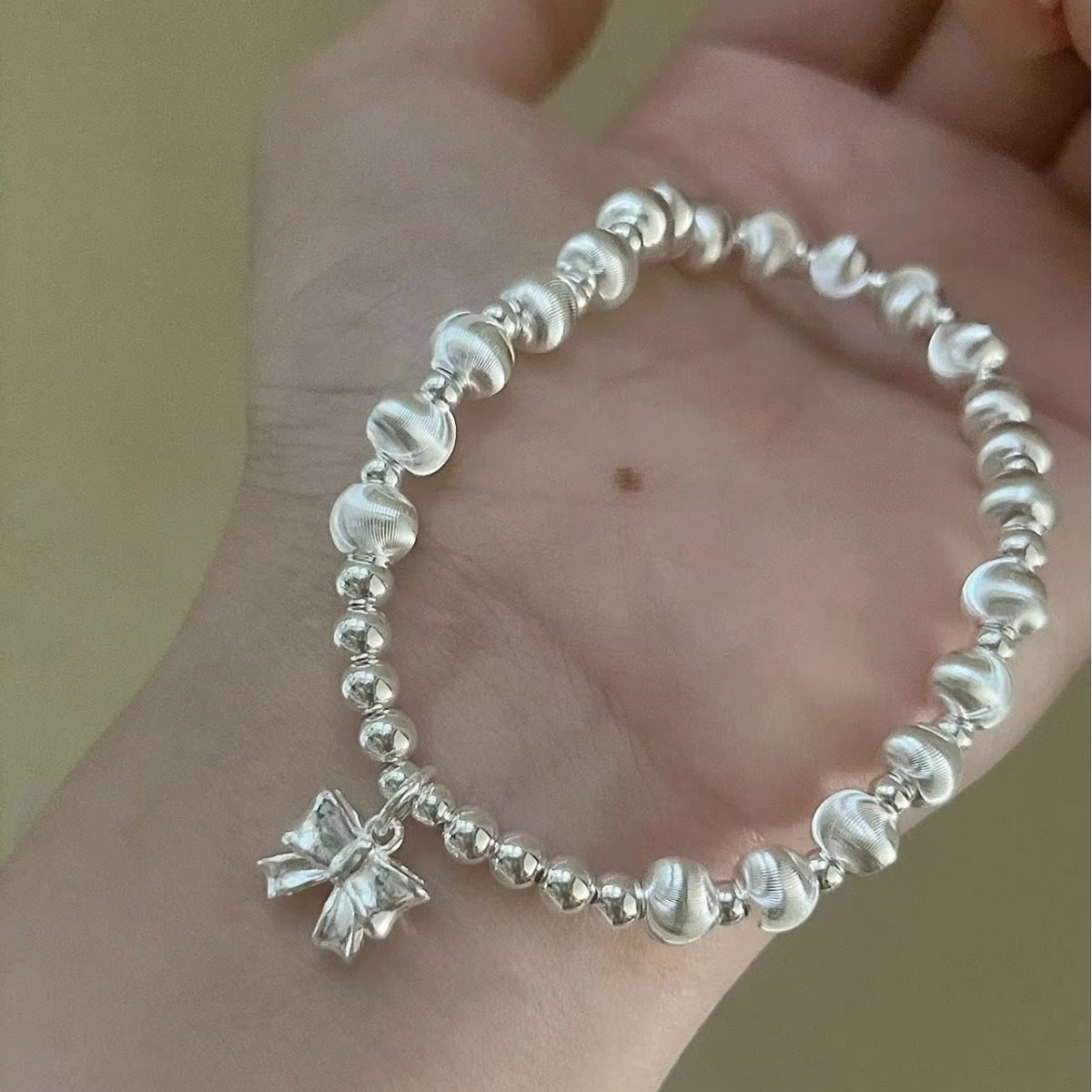 猫眼手链s925纯银蝴蝶结银珠手串女弹力绳转运珠手工简约小众手饰,淘宝优惠券,粉丝福利购,淘宝优惠卷