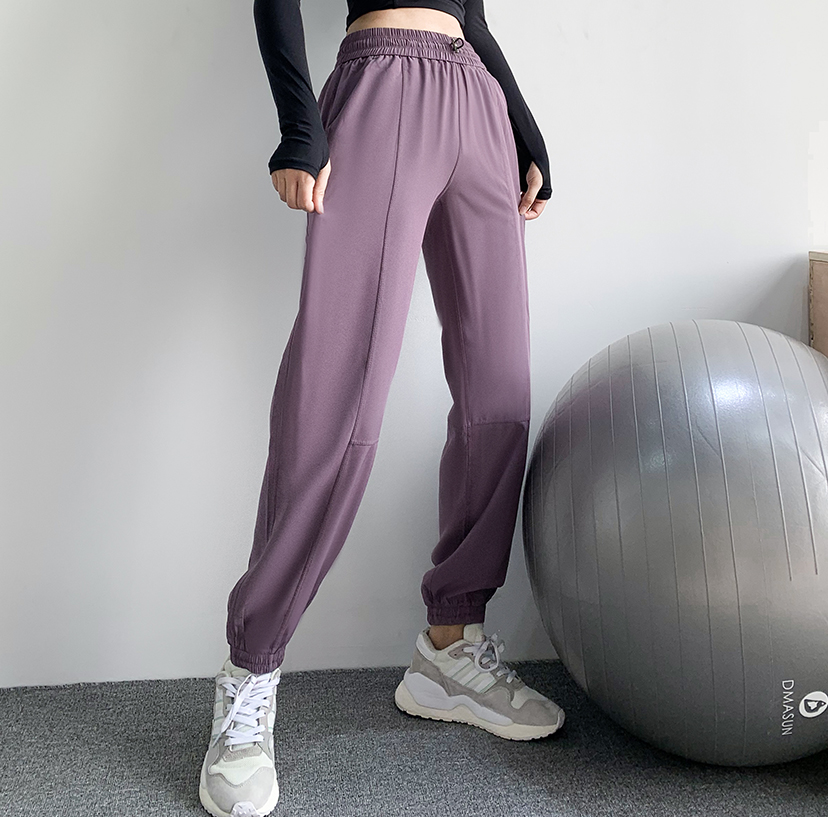 Loose fitting sports pants for women, showing slimming and high waist, quick drying fitness pants for women, running, casual, and foot closing yoga pants for women