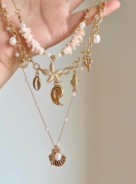 金色贝壳海星珍珠流苏项链女新款海边度假风颈链三层叠戴锁骨链潮