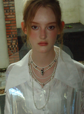 珍珠钛钢铆钉海螺层叠组合项链