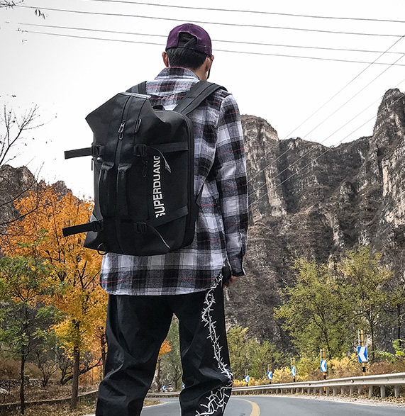 旅行大容量户外轻便防水男女登山包 仟仁狮双肩背包