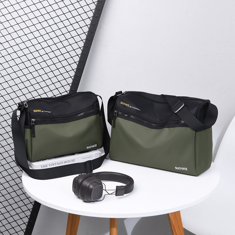 2025夏新款男士单肩包休闲斜挎包男款潮牌大容量邮差包拼接款男包,淘宝优惠券,粉丝福利购,淘宝优惠卷