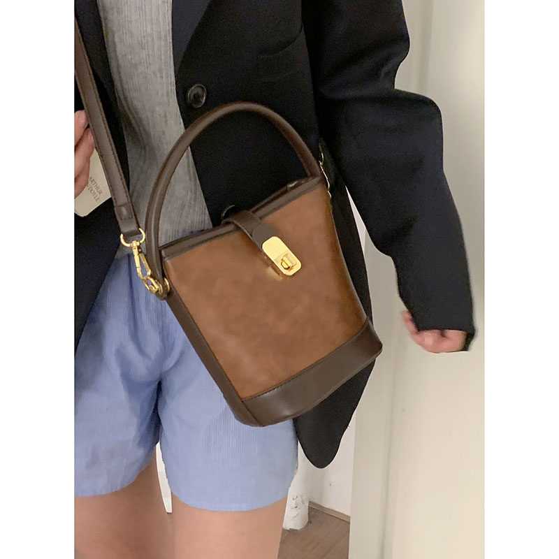 秋冬美拉德手提包包女2023新款潮复古撞色水桶包小众百搭斜挎包,淘宝优惠券,粉丝福利购,淘宝优惠卷