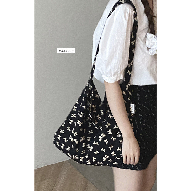 章若楠同款碎花帆布包包女夏天2025新款潮韩国托特包大容量水桶包,淘宝优惠券,粉丝福利购,淘宝优惠卷