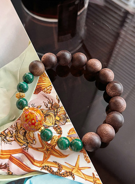 大漆珠孔雀石沉香单圈手串