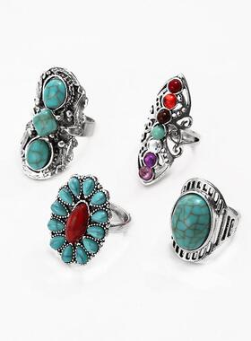 O.S.A.s green pinestone ring is fashionable with four combi