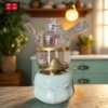 Wine bottle and tea lamp tea stove health lamp