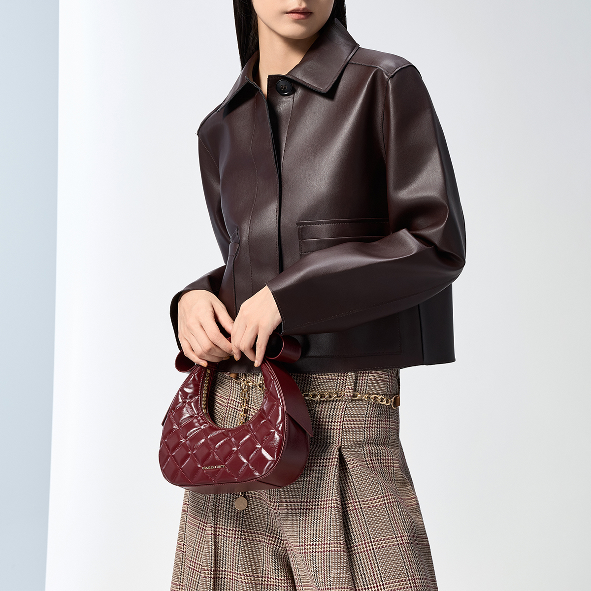 CHARLES&KEITH25冬新款CK2-40701603-A菱格蝴蝶结手提新月包婚包 - 图1