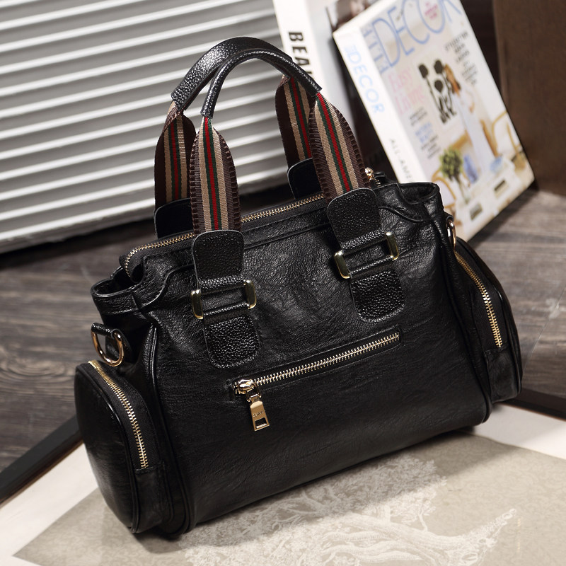 琉宇女2020新款潮百搭织带手提包 琉宇女士包袋