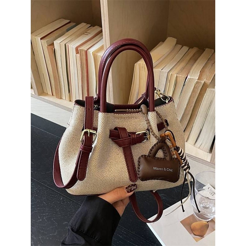 专柜品牌秋冬复古手提水桶小包包流行单肩包2025新款时尚百搭通勤,淘宝优惠券,粉丝福利购,淘宝优惠卷