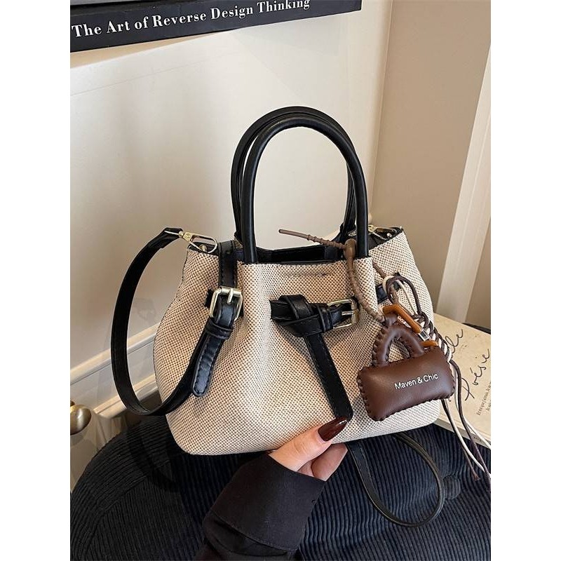 专柜品牌秋冬复古手提水桶小包包流行单肩包2025新款时尚百搭通勤,淘宝优惠券,粉丝福利购,淘宝优惠卷