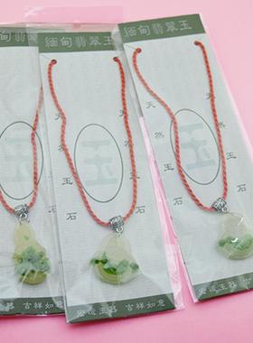 Street vendor sourced jade and resin Buddha pendants, Maitre