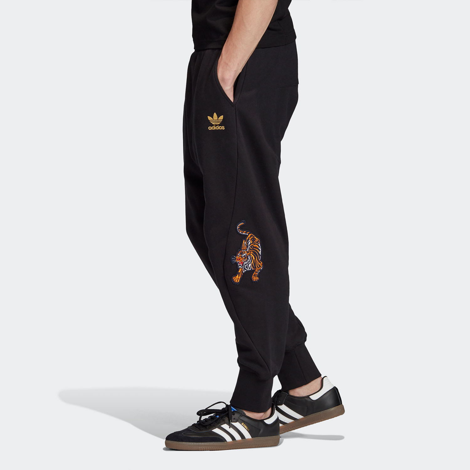 Adidas/阿迪达斯正品男子春节印花TRACK PANT运动收脚裤 GC8693 - 图1