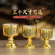 Offerings, wine cups, tribute cups, God of Wealth cups, holy water cups in front of the Buddha