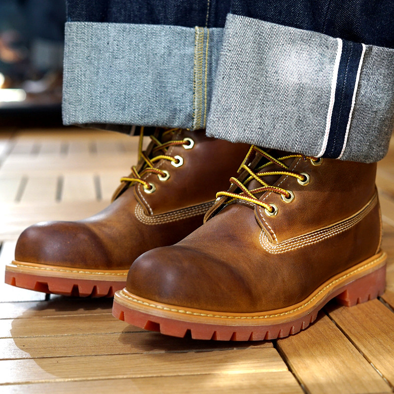 Elegant golden Chelsea boots