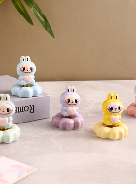 网红可爱陶瓷旋转拉兔兔迷你小摆件创意卡通桌面工艺品车载装饰品