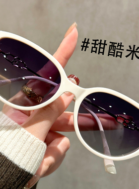 显白橄榄色超轻TR墨镜女时尚猫眼