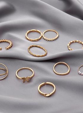Ten sets of ring, butterflies, pearls, cross-knit rings.