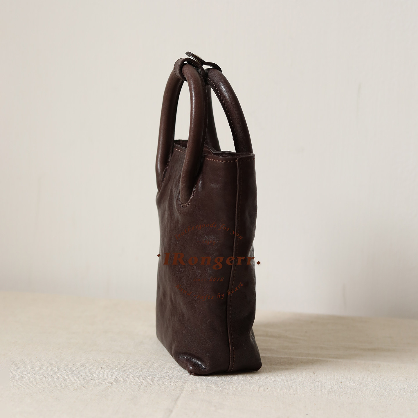 荣轻复古头层牛皮水桶包水晶植鞣皮迷你手提包小众简约斜挎手机包,淘宝优惠券,粉丝福利购,淘宝优惠卷