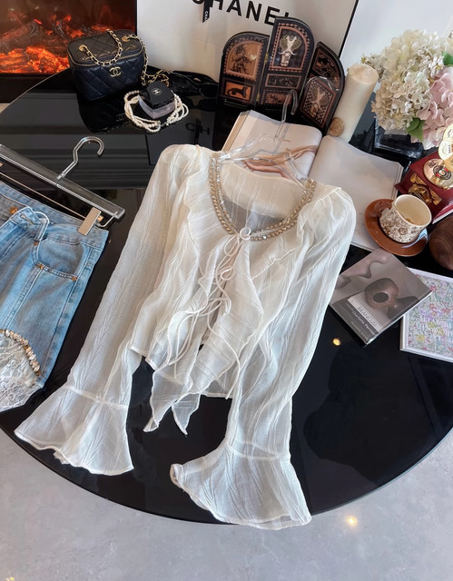ເດັກຍິງຮ້ອນ ruffled Floral Chiffon Shirt ດ້ານເທິງຂອງແມ່ຍິງອຸດສາຫະກໍາຫນັກສີຂາວເພັດ lace Up ວ່າງກະດິ່ງເສື້ອຢືດ