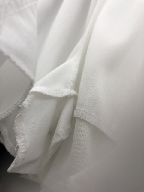 Niche ruffle-edged flower bud short skirt for women in white super fairy