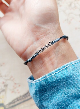 925银镂空六字真言文艺编织手绳