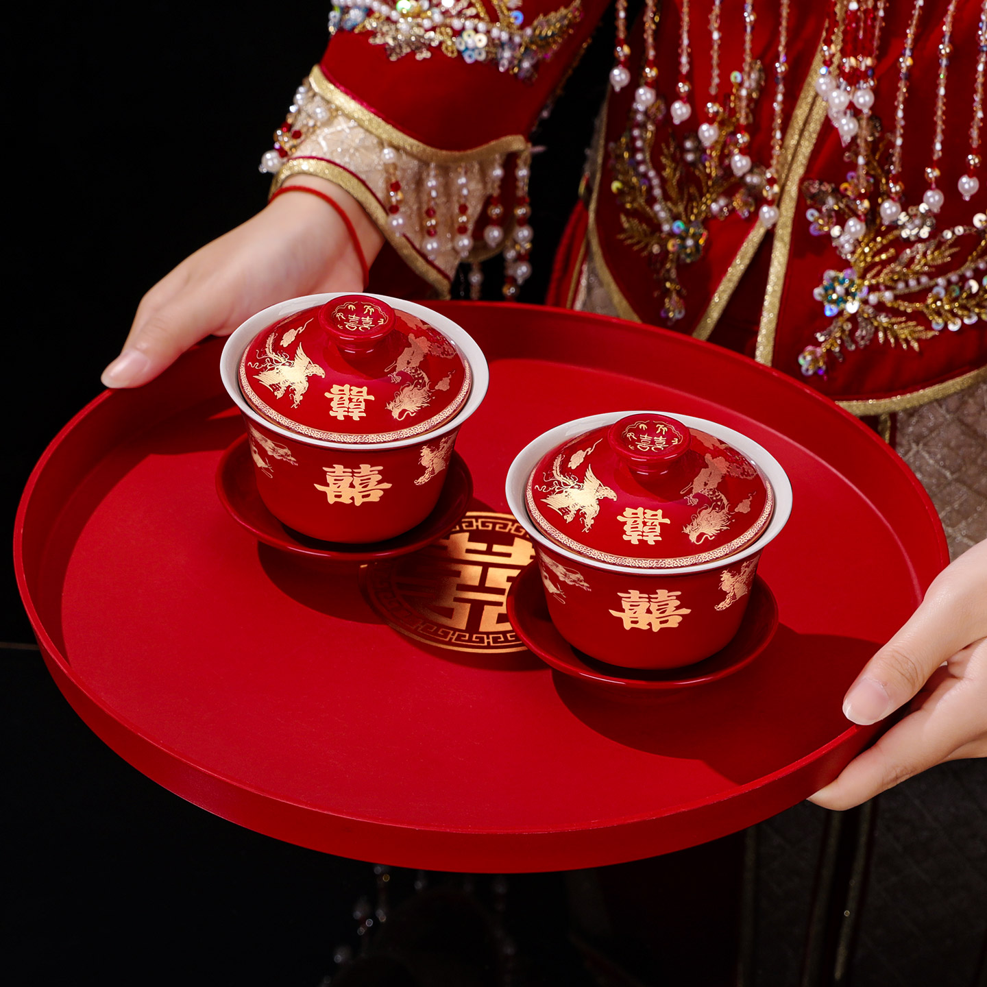 A pair of tea cups and a wedding tea set