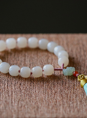 藕粉色手持手串桃蹊天然和田玉