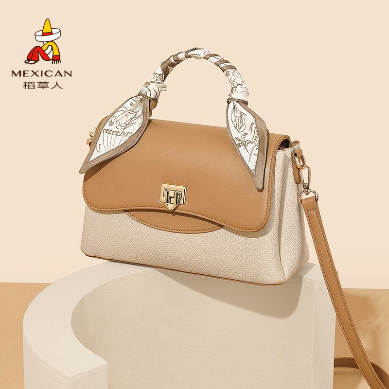 稻草人女士今年流行小众复古手提包 稻草人箱包女士包袋