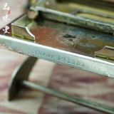 В 1930 -х годах антикварная сигаретная нагревателя французской машины.