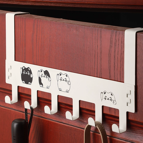 Крюк -крюк крючков крючков за дверью висит вешалку, висящую на двери, и висят крюк за дверью за дверью спальни