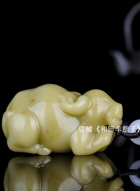 天然新疆和田玉糖玉牛手把件