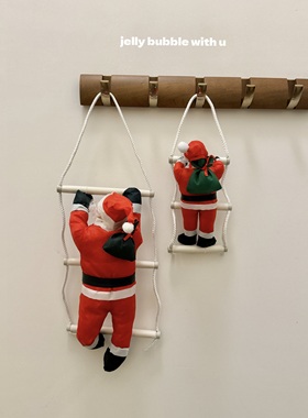 爬梯的圣诞老人橱窗窗户